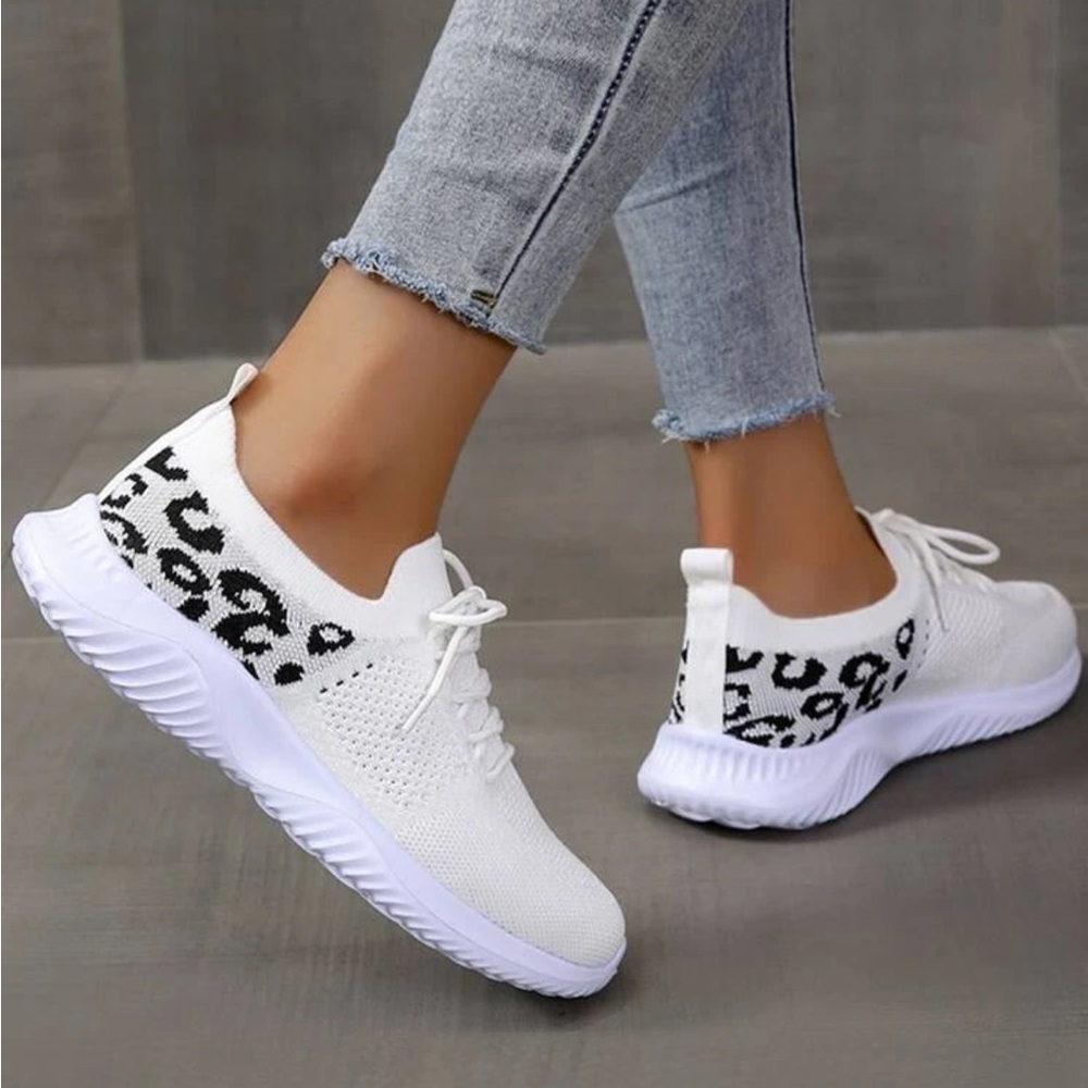 White and black slip on.